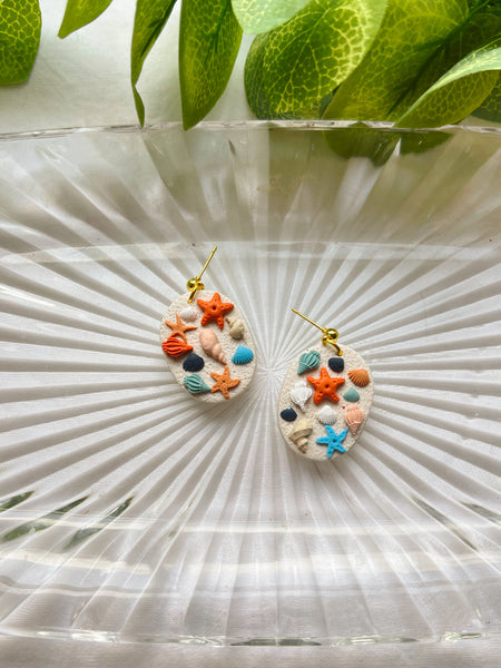 She Sells Seashells Dangles